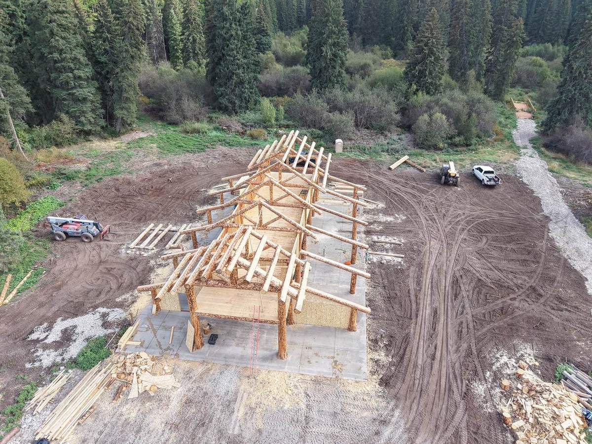 The framed barn from above with the roof structure complete