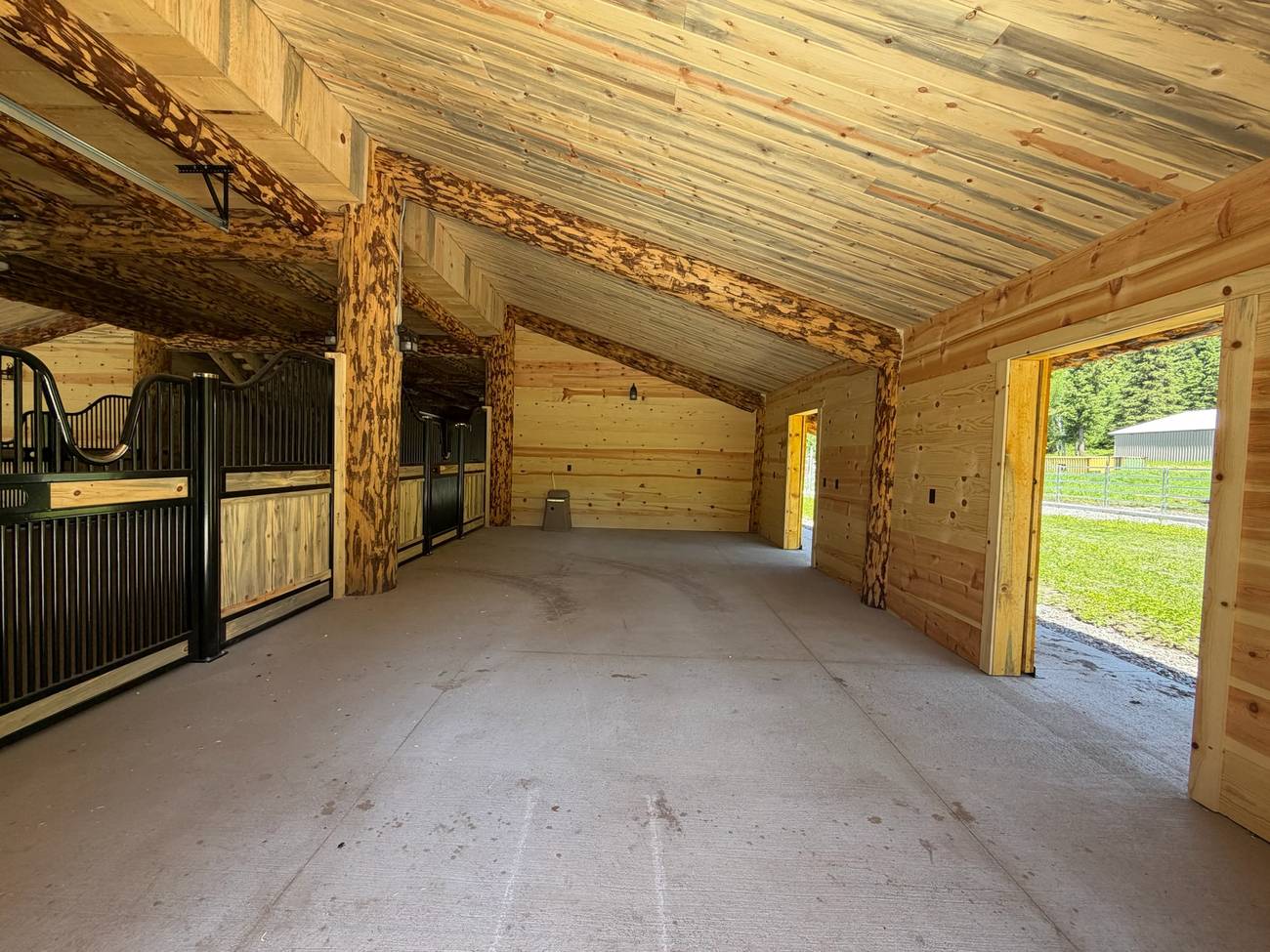 The barn breezeway looking out to daylight