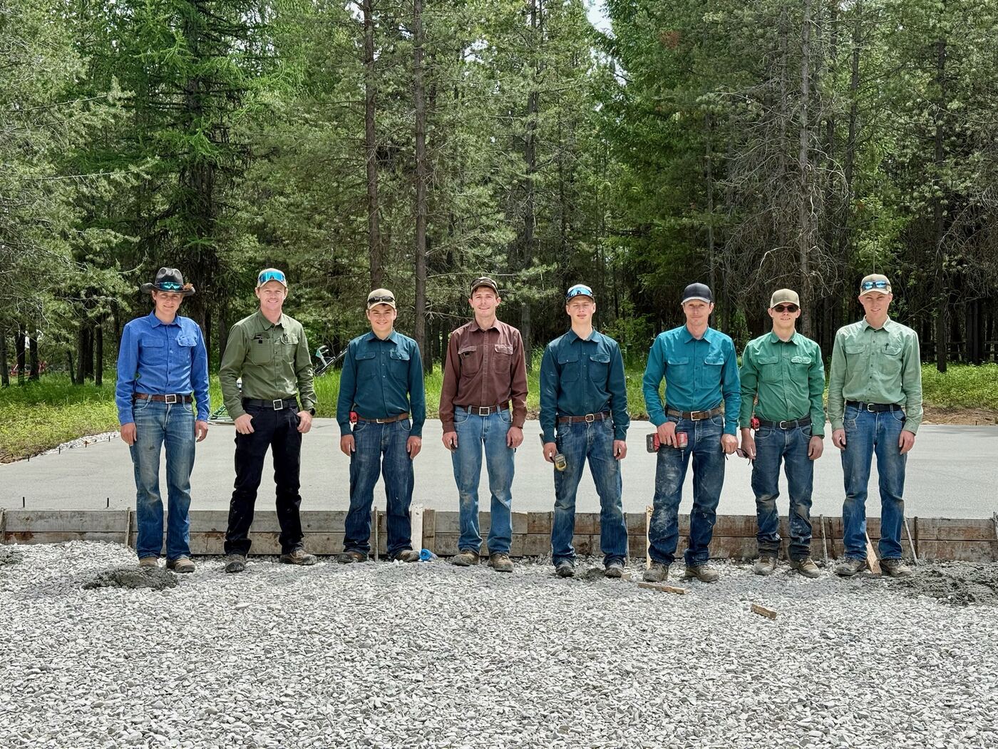 Eight of the Worthnest crew lined up along the edge of the finished slab